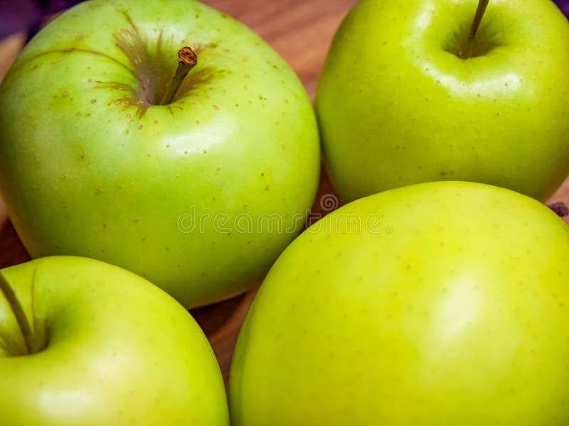 These green apples, ready for consumption, can be featured in cooking or baking guides royalty free stock photos