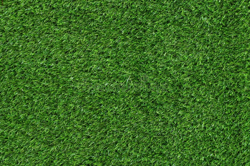 Green artificial grass texture ground football. royalty free stock photos