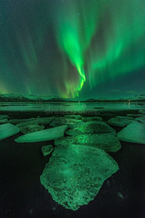 A green aurora over the Jokulsarlon lagoon, Iceland stock images A green aurora over the Jokulsarlon lagoon, Iceland stock images