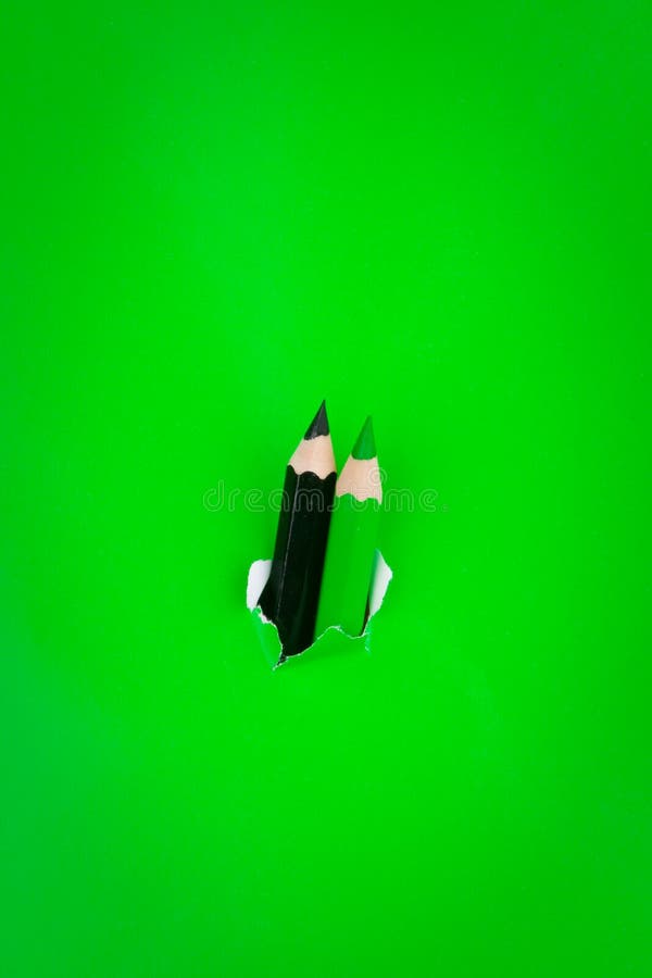 Green background with pencils royalty free stock photos