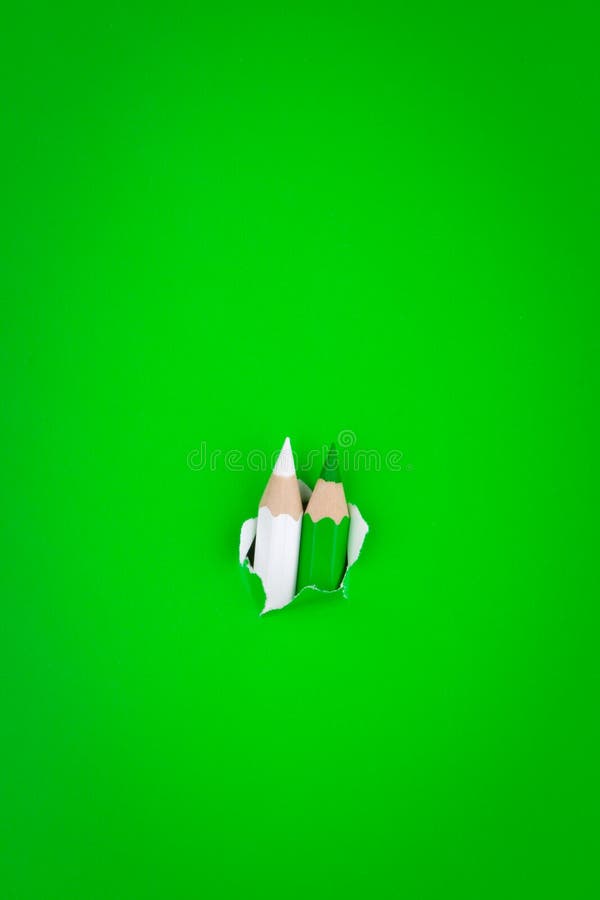 Green background with pencils royalty free stock photo