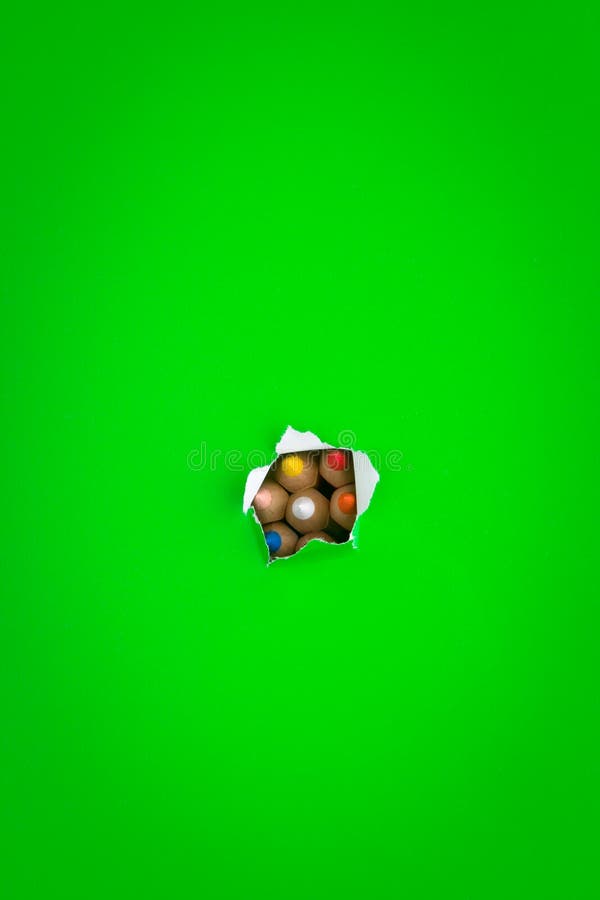 Green background with pencils royalty free stock photography