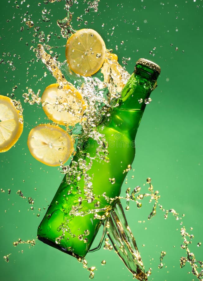 Green Beer Bottle with Splashing Liquid Stock Image Image of amber