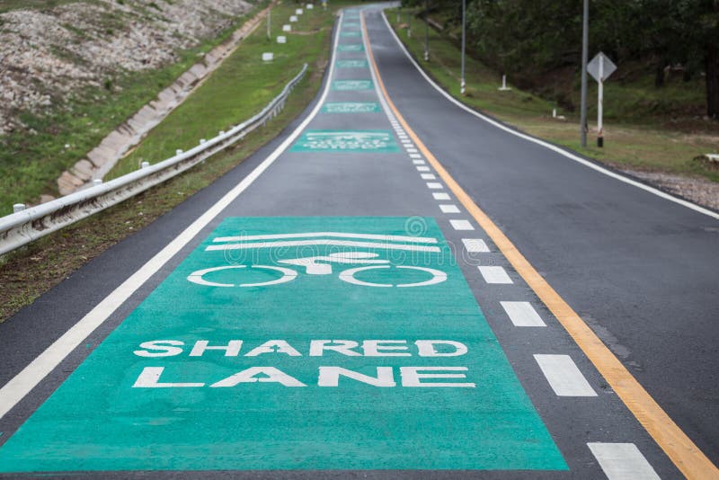 Green Bicycle Lanes on the Asphalt Road Stock Photo Image of asphalt