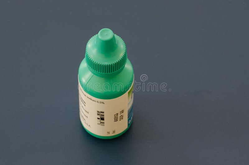 Green bottle of eye drops stock image. Image of drops 37438215