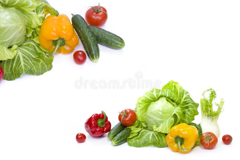 Green cabbage. Yellow pepper. Red tomatoes and cucumbers on a wh stock image