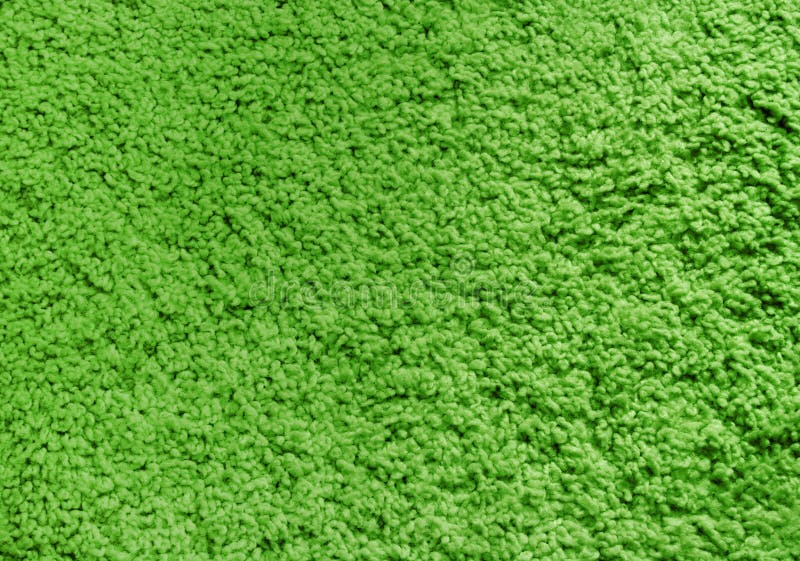 Fluffy green carpet, texture, background.