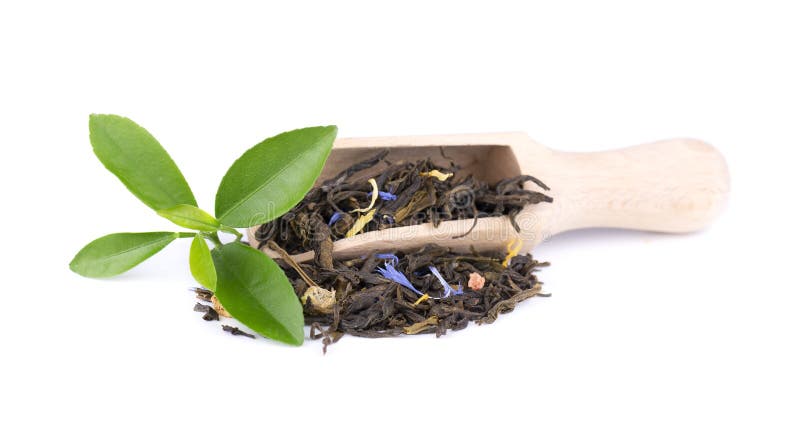 Green Ceylon tea with cornflower and candied fruit, isolated on white background. royalty free stock image Green Ceylon tea with cornflower and candied fruit, isolated on white background. royalty free stock image