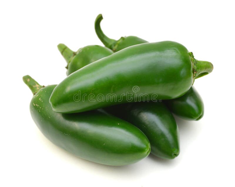 Bunch of fresh green chili peppers on a white background