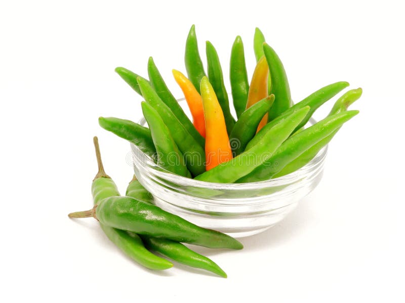 Green chili peppers in glass bowl
