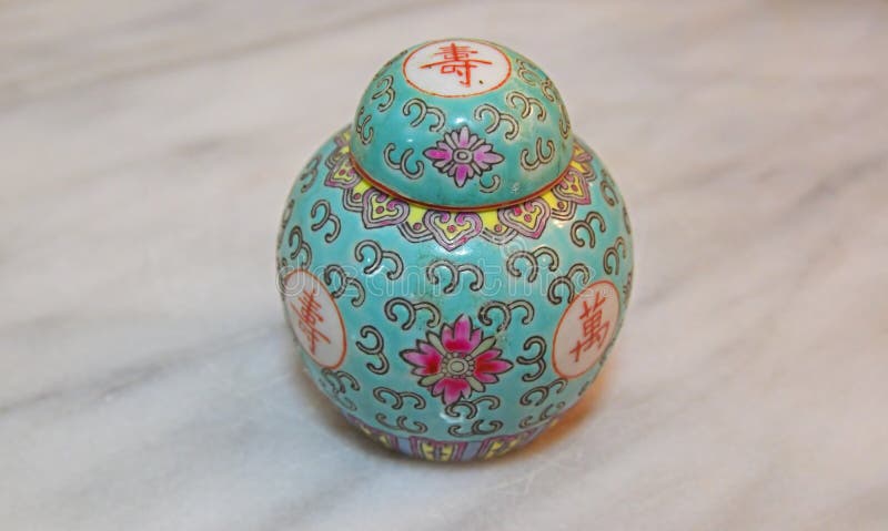 Green Chinese Porcelain Ginger Jar and Lid Cover on Marble Table