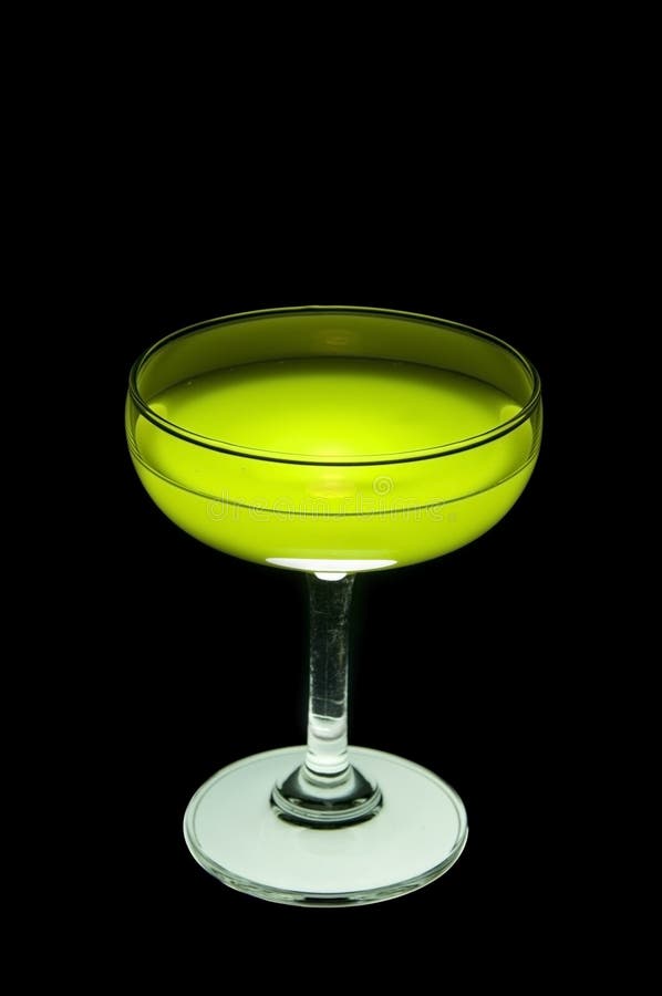 Green cocktail on glass