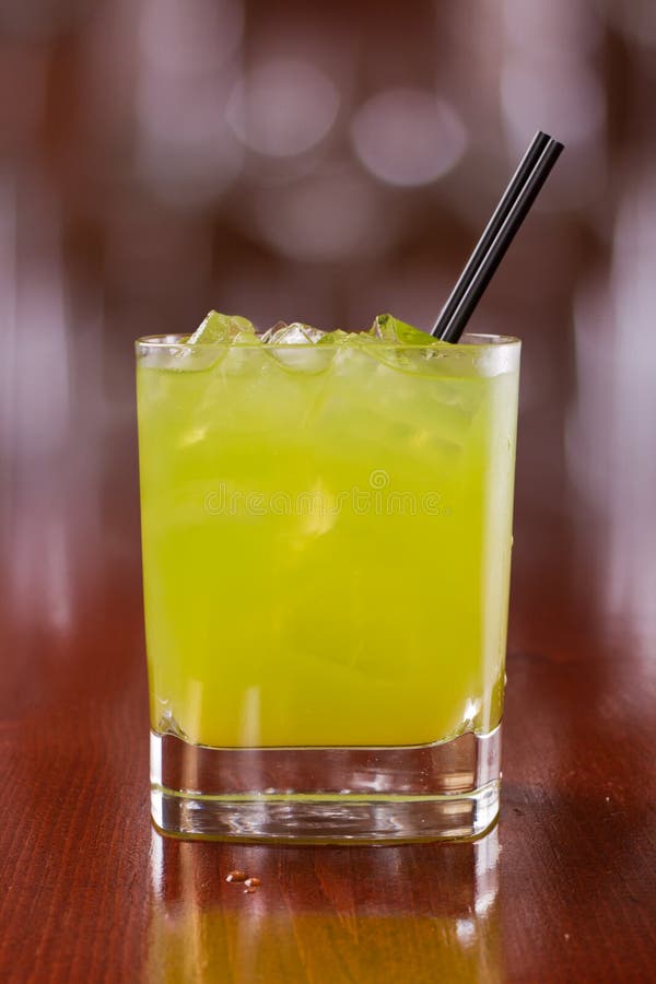 Green cocktail on the rocks