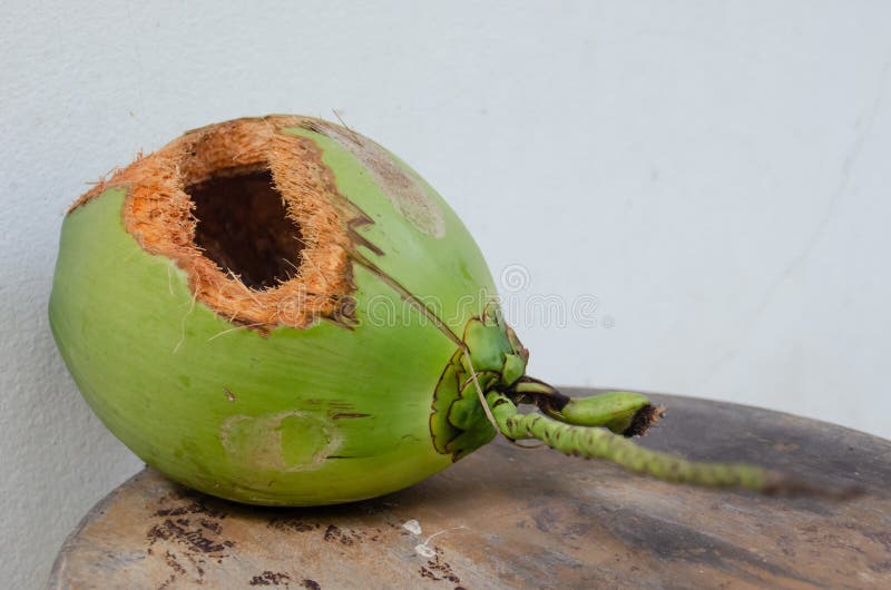 Green Coconut With Hole On Table Stock Image - Image of farm, gourmet ...