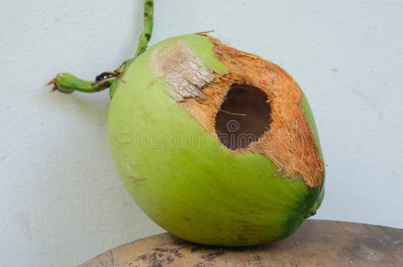 Green Coconut with Hole on Table Stock Photo - Image of ingredient ...