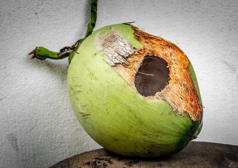 Green Coconut With Hole On Table Stock Image - Image of drink ...