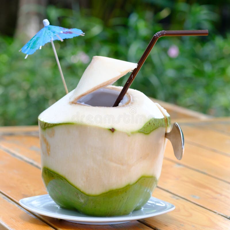 283 Tropical Green Coconuts Drinking Stock Photos Free & RoyaltyFree