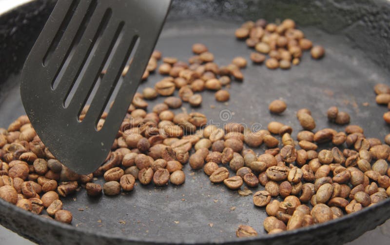Green Coffee Beans Roasting on the Black Pan Stock Photo Image of