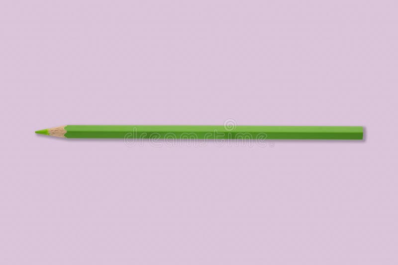 Green color pencil on pink background