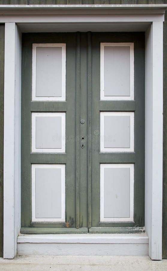 Green Colorful Door in Old House stock image