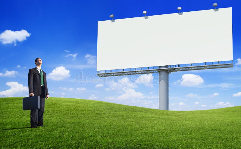 Green Concept Business Man and an Empty Billboard