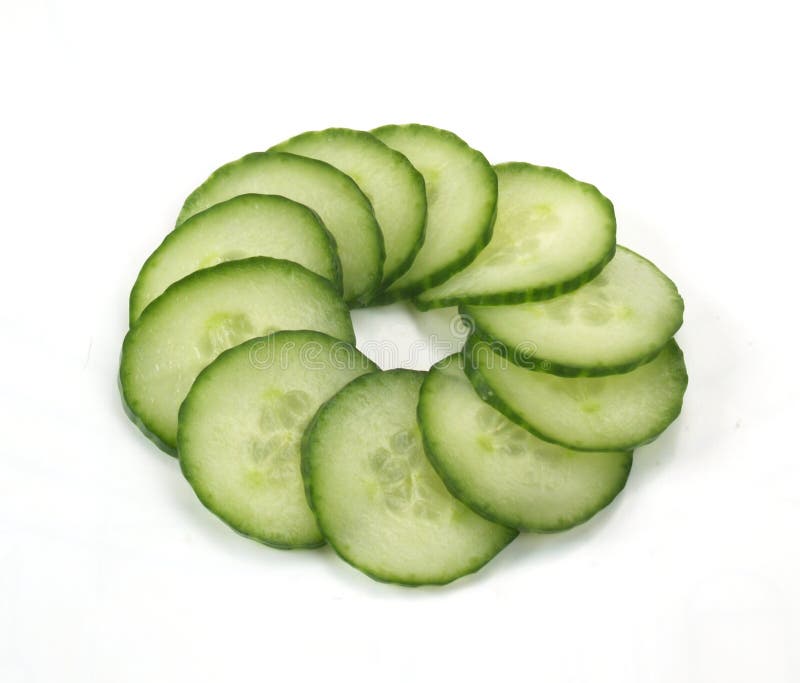 Green cucumber on white backgr stock photos