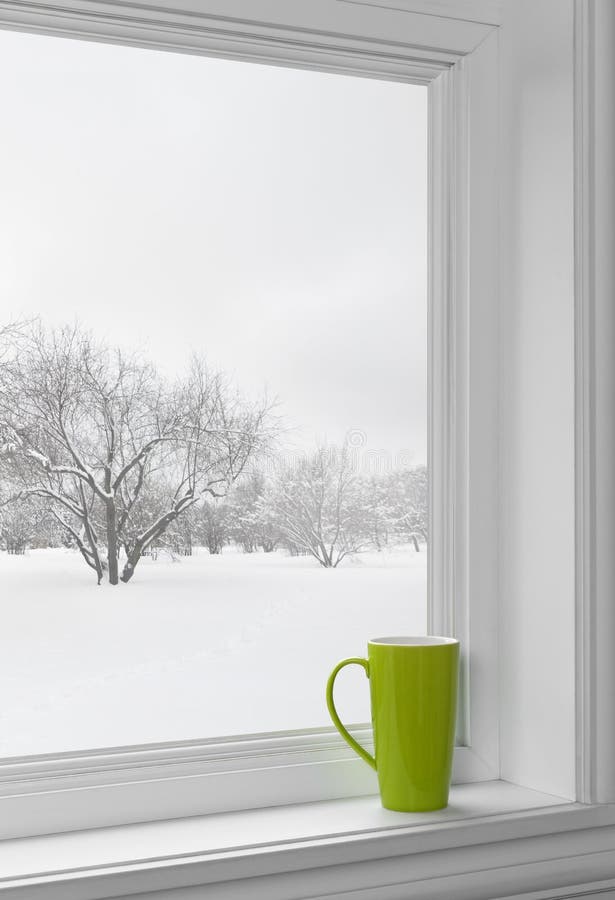Green cup on a windowsill royalty free stock photography Green cup on a windowsill royalty free stock photography