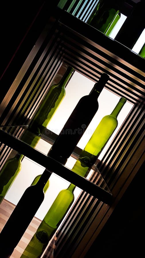 Green and Dark Vine Bottles in a Multiple Compositions Stock Image