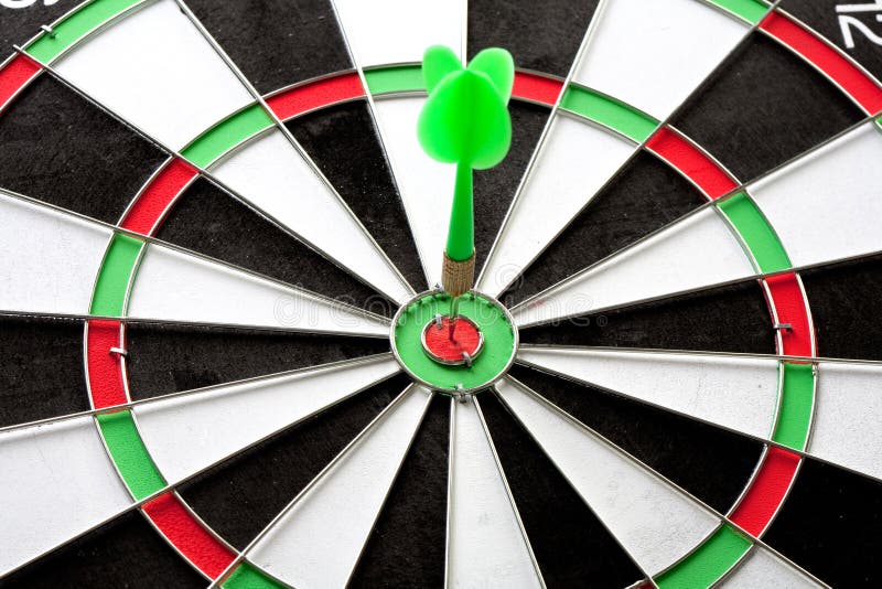 Bullseye dart on dartboard stock photo. Image of dartboard 549344