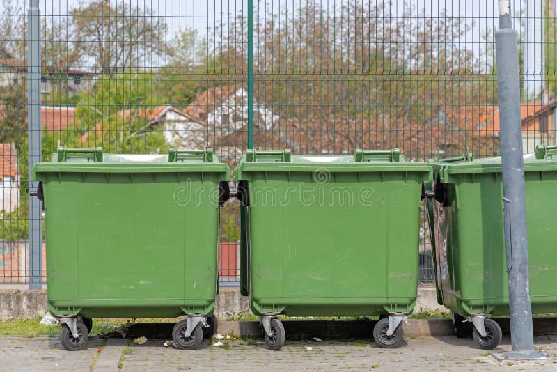 Green Dumpsters stock image. Image of containers, dumpster 219034415