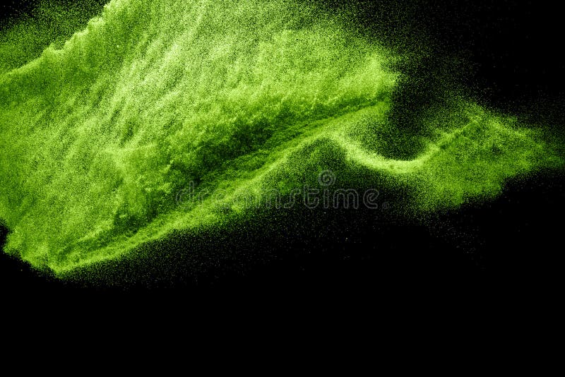 Green Dust Particles Explosion on Black Background. Powder Dust Splash