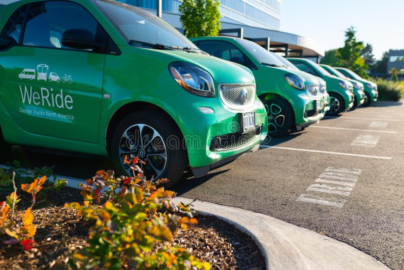 Green Electric Vehicles on the Parking Lot Editorial Photo Image of