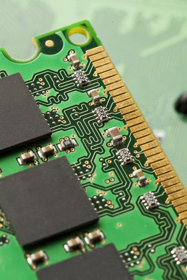 Green Electrical Circuit Board with Microchips and Transistors Stock