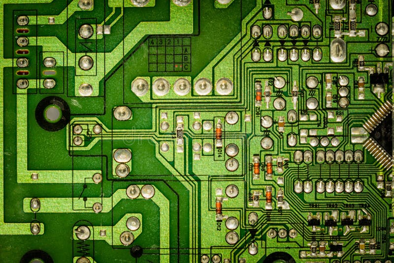 Green Electronic Circuit Board With Many Electrical ...