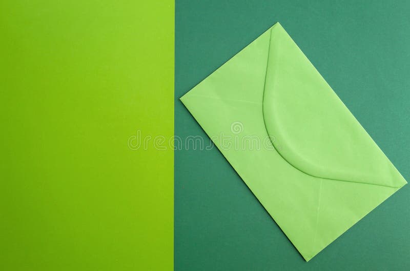 Green Envelope on Colourful Greenery Background. Minimal Concept Stock Photo Image of cover