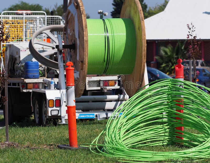 Fiber Optic Cable Reel on a Roadside Trailer Editorial Photography