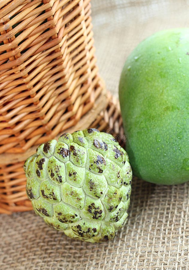 Green fresh mango and custard apple