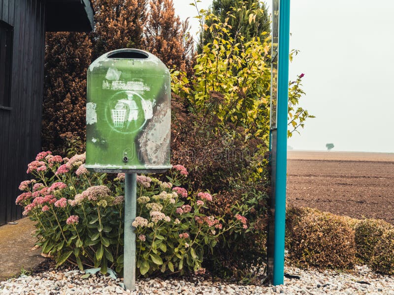 Green Garbage Can at a Bus Top in Germany Stock Photo Image of