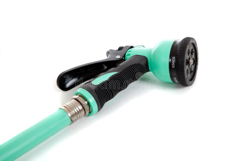 Green garden hose with spray nozzle