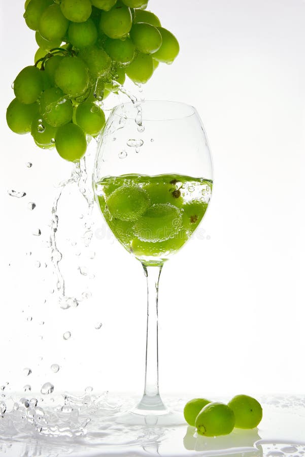 Green grape with water splash into glass royalty free stock image Green grape with water splash into glass royalty free stock image
