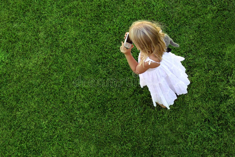 Green grass background and girl stock photos Green grass background and girl stock photos