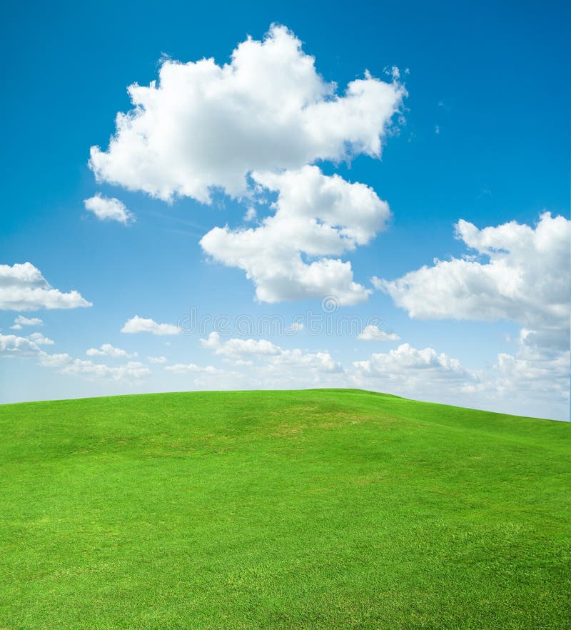 Green Grass Field And The Clouds Stock Photo - Image of blue, grassland