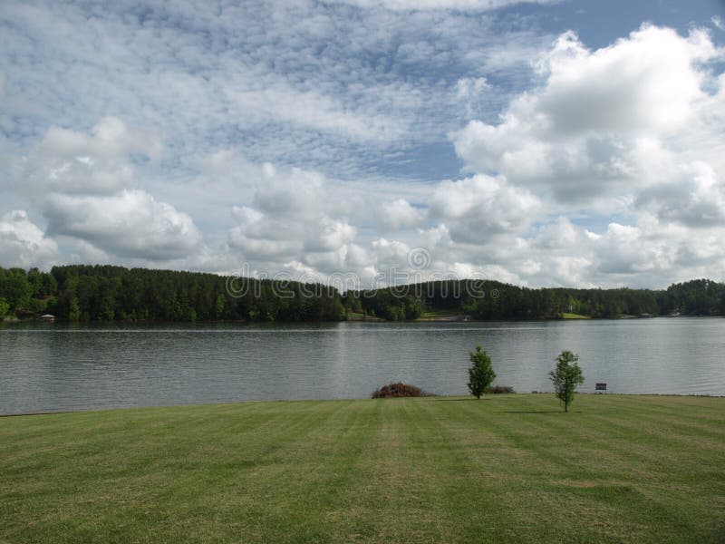 Green grass leading to the lake