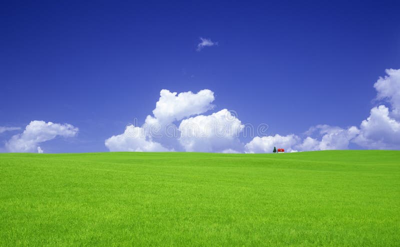 Green grass and red roof house stock photos Green grass and red roof house stock photos