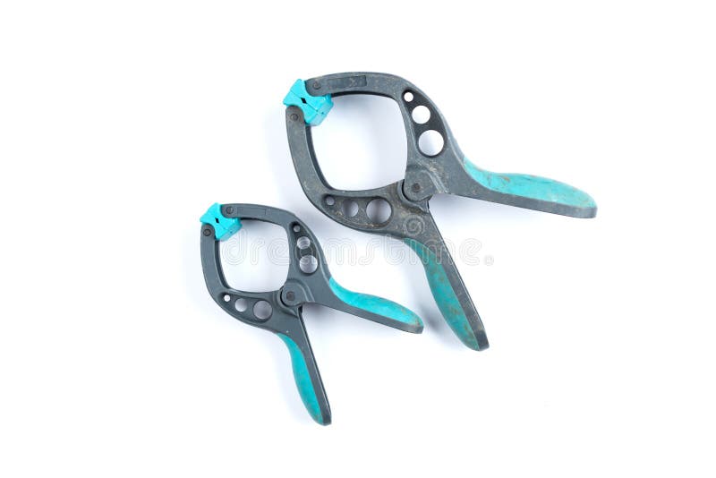 Plastic Clamp Isolated on a White Background. Green Plastic Spring Clamp Stock Photo Image of