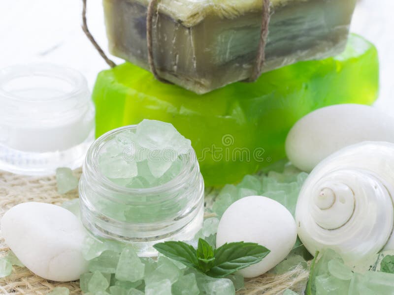 Green herbal soaps with spa settings