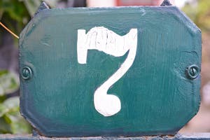 A Green House Number Plaque Showing The Number Seven Stock Photo A Green House Number Plaque Showing The Number Seven Stock Photo
