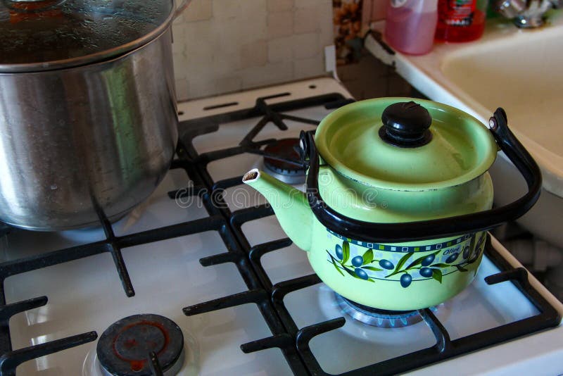 Green Tea Kettle on Stove stock image. Image of real 29584145