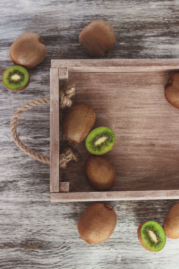Green Kiwis In The Wooden Tray Stock Photo Image of background
