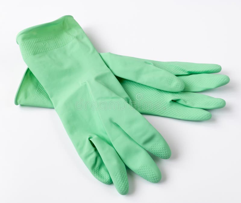Green Latex Dishwashing Gloves on a White Background Stock Photo